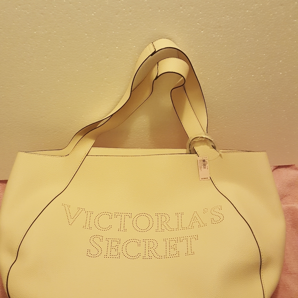 Victoria's Secret faux leather perforated logo and wristlet